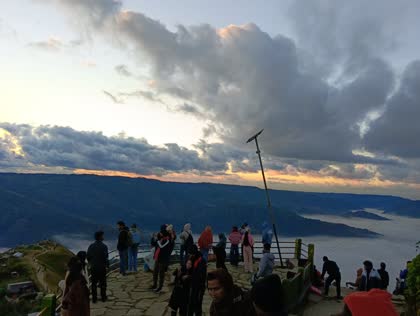 Visitors gathered at a Meghalaya sunrise viewpoint
